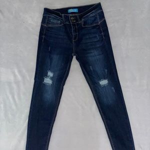 Dark blue ripped jeans